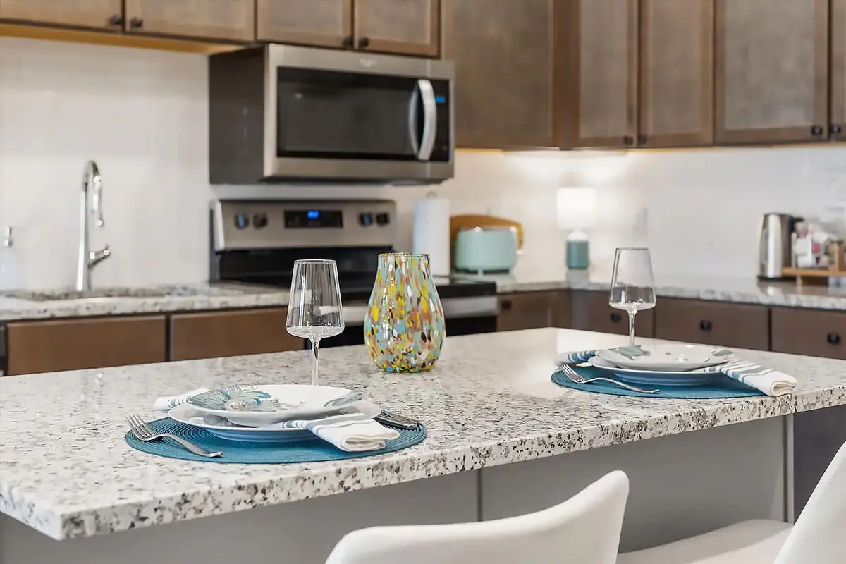 Modern kitchen with set dining table